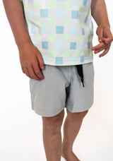 Solid light gray outer layer for a clean, versatile look

Inner layer with pastel checkered print for a pop of fun

Elastic waistband with adjustable drawstring for the perfect fit

Lightweight, breathable fabric for all-day comfort

Ideal for sports or casual wear

Available in boys sizes 2T–9/10