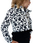 Moo-ve over, boring basics — this cropped athletic jacket is bringing the&nbsp;fun to functional! Designed in a bold black-and-white cow print with sporty vibes and a playful ruffle hem, this zip-up is a whole mood. Perfect for little fashionistas who like their looks with a little flair and a whole lot of confidence.

Whether she’s headed to gymnastics, recess, or just taking the driveway runway by storm — this jacket’s got her covered.

Details:

Bold cow print on soft, stretchy performance fabric

