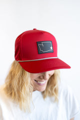 Crimson Washington state snapback hat with star location patch, rope detail, structured trucker cap for women, sporty gameday accessory
