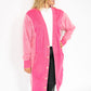 Vibrant pink body with textured contrasting sleeves

Longline fit with front button closure

Functional front pockets for all the essentials

Soft + comfy sweatshirt material for everyday wear

Relaxed fit – easy to style up or down

Available in XS or One Size