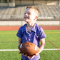 🏈 Details:

Vibrant purple fabric with tonal football-themed doodle print
Button-up collar for that dressed-up-but-ready-to-rumble vibe
Soft, lightweight performance-style material—great for running, cheering, or touchdown dancing
Unisex fit, available in sizes 2T through 7/8
🔥 Perfect for school spirit days, Saturday tailgates, or backyard football showdowns. This polo is game day goals.