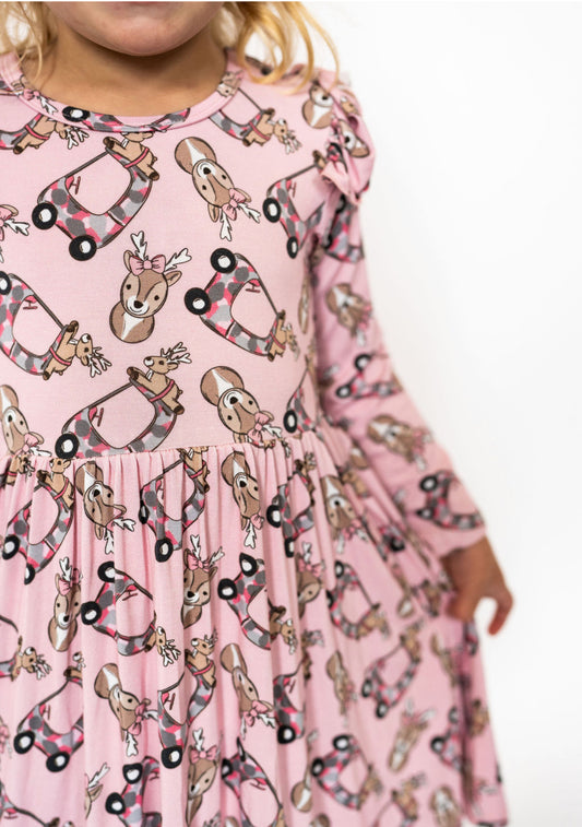 Long sleeve dress with ruffle shoulder detail
Allover pink hunting-inspired print (reindeer + camo cars)
Soft + breathable bamboo fabric (gentle on sensitive skin)
Stretchy and comfortable for all-day play
Twirl-friendly skirt design kids love
