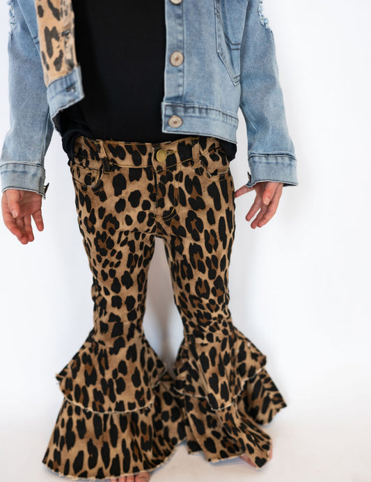 All-over leopard print for a trendy, standout look

Tiered flare bottoms for extra volume and sass

Classic 5-pocket design with functional button &amp; zip closure

Soft, durable fabric with a hint of stretch for comfort

Raw hem edges for a touch of edge

Available in toddler &amp; youth sizes 2T–7/8
