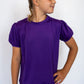Gorgeous deep purple color for a vibrant pop

Adorable scalloped hem for a girly touch

Short puff sleeves with elastic cuffs

Soft, stretchy fabric for comfort all day long

Perfect for pairing with leggings, jeans, or skirts

Available in toddler &amp; youth sizes 2T–9/10