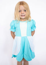 Soft puff sleeves for a classic princess look
Beautiful blue bodice with white apron-style accents
Charming bow-back detail with peekaboo cutouts
Built-in matching shorts for carefree play and extra coverage
Stretchy, breathable fabric for all-day comfort