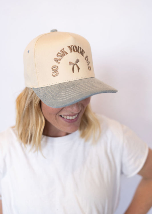 Neutral cream crown with soft gray brim
Embroidered “Go Ask Your Dad” detail with bow accent
Adjustable back for the perfect fit
Lightweight + breathable for everyday wear
Ideal for errands, messy-hair days, or just keeping it real
