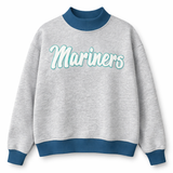 Gray mock neck crewneck with blue trim and chenille script lettering with sparkle outline styled in a baseball-inspired flat lay on white background 