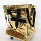 Shine bright and roll in style with the Simply Southern Rolling Tote in metallic gold. Perfect for travel, shopping trips, market days, or hauling your daily essentials, this tote is both eye-catching and practical.
Details:
Durable, water-resistant material for long-lasting use
Four smooth-glide wheels for 360° mobility
Dual handles for easy carrying when rolling isn’t an option
Spacious interior holds groceries, travel gear, or everyday must-haves
Metallic gold finish for a bold, fashion-forward look
