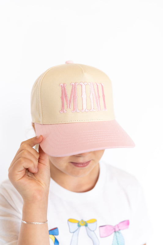 Embroidered “MINI” in bubblegum pink, Cream crown with light pink bill, Adjustable snapback for a perfect fit, Ponytail-friendly design for little fashionistas, Lightweight & comfy for everyday play

