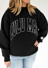 Lulu Mac black stitch mockneck terry cloth sweatshirt featuring oversized varsity-style lettering on the front, shown as a flat lay on a white background.