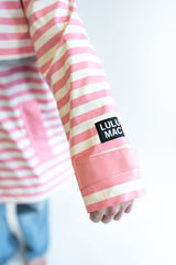 Lulu Mac Darby Pink and White Rain jacket with embroidered logo on the sleeve