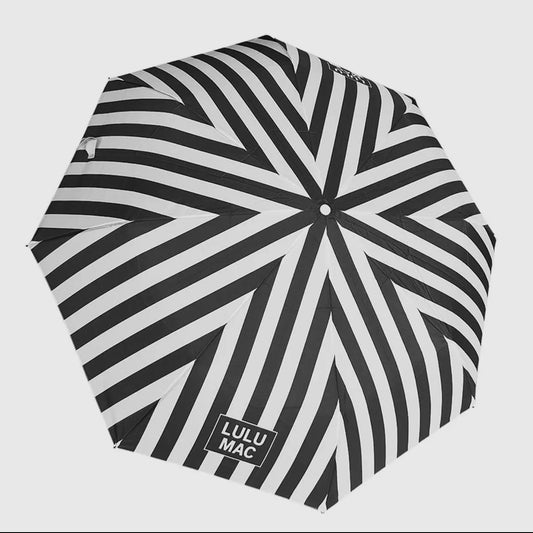 Black and White Striped Umbrella with LULU MAC branding