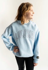 Youth girl wearing Lulu Mac Mono Crew in light blue 