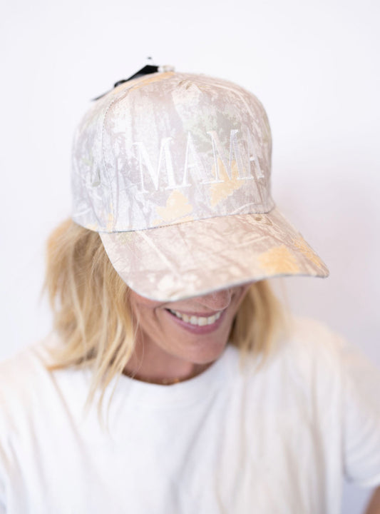 Neutral camo print with white embroidered MAMA detail
Adjustable back for the perfect fit
Lightweight + breathable for all-day wear
Effortless style—throw it on and go!
