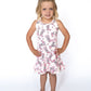 This dress is where cowgirl dreams meet twirly queen energy! Featuring a soft pink gingham backdrop, cow-print boots, darling bows, and sweet little stars — it’s the ultimate outfit for your mini wildflower