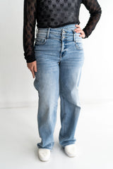 Jeans with crossover button detail, relaxes, straight leg, light wash with soft fading