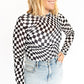 Optical Illusion Mesh Long Sleeve, Black + white distorted checkerboard print
Soft, stretchy mesh for a fitted look
Lightweight and breathable
Perfect under graphic tees, over bralettes, or tucked into denim
A little edgy, a lot iconic