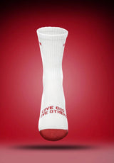 Pathos white sock with red text " Love God, Love Others" and a red toe