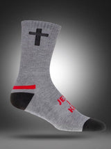 Pathos Gray sock with black cross and red stripe with text "Jesus is King"  on a gray background