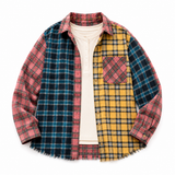 Colorful plaid patchwork flannel with button-front closure, chest pocket, long sleeves, and a relaxed oversized fit on a white background.