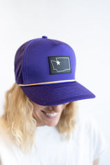 Purple Washington state snapback hat with star location patch, gold rope detail, structured trucker style cap for women and gameday outfits