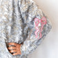 Allover grey and tan camo print
Embroidered pink bow accents on sleeves 🎀
Soft fleece interior for all-day comfort
Front kangaroo pocket
Relaxed, oversized fit
Hooded with drawstring
Available in sizes XS–XXL