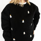 Black crewneck sweatshirt with embroidered ghost details

Soft + cozy cotton blend fabric

Relaxed, unisex fit for all-day comfort

Playful, festive design perfect for fall + Halloween

Adult sizes XS–XXL