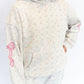 Light heather grey base with tiny pink floral print
Embroidered pink bows on sleeves 🎀
Soft fleece interior for all-day comfort
Front kangaroo pocket
Relaxed, slightly oversized fit
Matching sweatpants available for the full set
Available in sizes XS–XXL