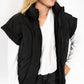 Classic black quilted puffer style
Lightweight yet cozy – perfect for layering
Sleeveless design with cuffed shoulders for a trendy twist
Full front zipper closure for easy wear
High collar to keep out the chill
Available in sizes S–XXL
