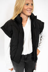 Classic black quilted puffer style
Lightweight yet cozy – perfect for layering
Sleeveless design with cuffed shoulders for a trendy twist
Full front zipper closure for easy wear
High collar to keep out the chill
Available in sizes S–XXL