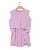 Simply Southern pink activewear set featuring a sleeveless ribbed top and matching elastic-waist skort on a white background.