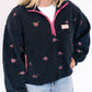 avy sherpa pullover with allover pink rose embroidery

Half-zip closure with hot pink zipper detail

Relaxed fit with roomy sleeves for ultimate comfort

Simply Southern branded patch on chest

Soft + warm for everyday layering