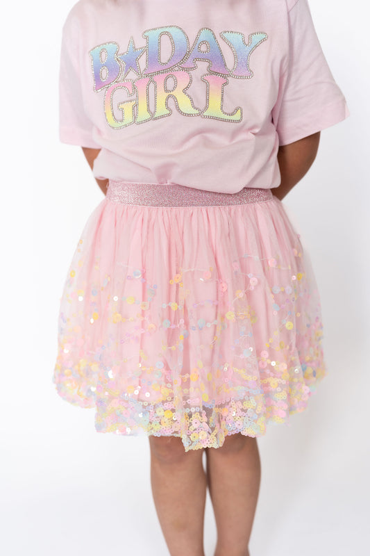 Confetti tutu skirt for toddlers and youth . With layers of soft pink tulle, rainbow confetti sequins, and a glittery pink waistband, it’s the perfect combo of comfort and shimmer