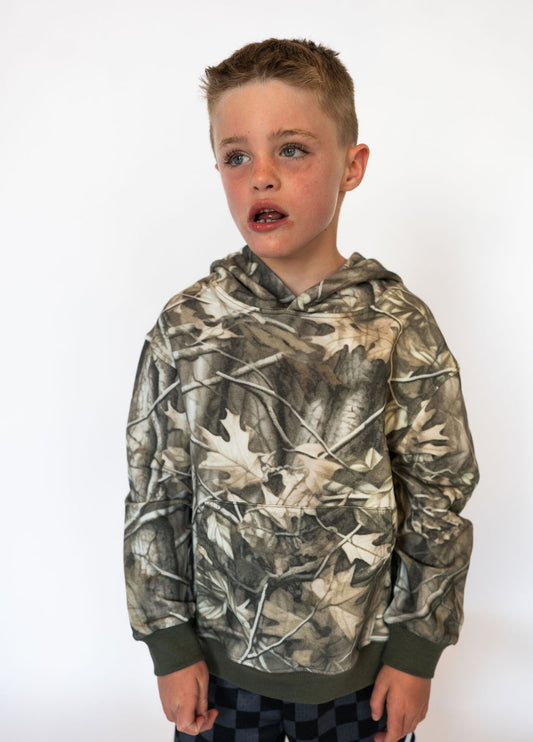 Details:

All-over camo print for an outdoorsy look
Soft, mid-weight fabric for warmth without bulk
Ribbed cuffs and hem for a secure fit
Front kangaroo pocket for keeping hands warm (or storing treasures!)
Roomy hood for extra coverage
Available in toddler sizes 2T–6T
