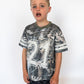 Details:

All-over camo print with white “21” graphic on front & back
Soft, breathable mesh fabric for comfort
Short sleeves with sporty stripe accents
Ribbed V-neckline for a classic jersey look
Available in toddler sizes 2T–6T