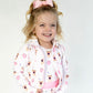 Toddler and youth sized athletic jacket. Pink zipper and pockets. White with fun frappdacino and cake pop graphics