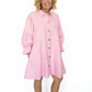 Turn heads with the sweetest sparkle in our Pink Veveret Rhinestone Denim Dress! This playful button-down style combines a soft blush denim with all-over rhinestone stripes for the perfect mix of feminine charm and everyday comfort.

✨ Details:

Light pink denim with shimmering vertical rhinestone accents

Button-down front for easy wear

Relaxed, slightly oversized fit for a flattering drape

Side pockets for function and style

3/4 length sleeves with ruffled elastic cuffs

Available in sizes S–L