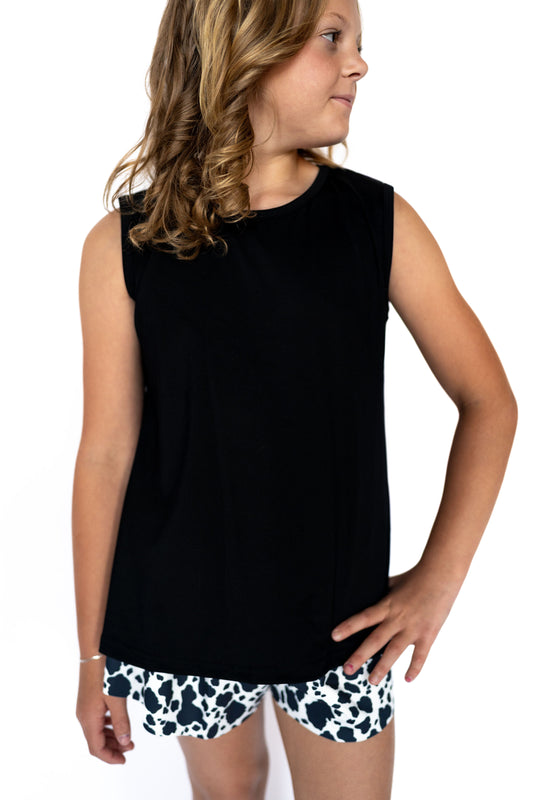This sleeveless staple is made for everything from playground adventures to picture-perfect moments, featuring a stylish tulip-back detail that adds extra flair to a simple silhouette.

Soft, breathable, and effortlessly cool — it's an easy win for any outfit combo!
