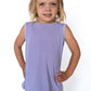 Soft and breathable fabric
Sleeveless cut with a relaxed fit
Overlapping tulip-style back hem
Color: Light purple
Pairs perfectly with our printed skirts or leggings
