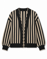 Black and cream striped open-front knit cardigan with scalloped trim, long sleeves, and a relaxed coastal-inspired fit.
