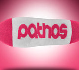 Red sock with 'pathos' branding on a pink background
