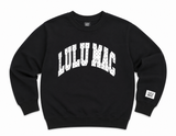 Lulu Mac youth black crewneck sweatshirt featuring a white collegiate-style Lulu Mac graphic with a black polka dot stitch pattern, displayed as a flat lay on a white background.