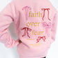 Soft pink crewneck sweatshirt

Front: embroidered bow detail

Back: “Faith Over Fear” embroidery with colorful bows + Psalm 118:6

Cozy cotton blend fabric

Relaxed fit for everyday comfort

Youth sizes S–L