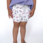 These playful printed shorts are a whole&nbsp;mood – featuring fun little doodles of sunnies, lip gloss, phones, milkshakes, and more! Perfect for twirling, lounging, or strutting their stuff in style. Smaller fitted shorts on the inside.&nbsp;
Made with soft, lightweight fabric for all-day comfort

Elastic waistband with a cute bow tie detail

Whimsical pastel icons for the ultimate girly vibe

Easy pull-on design for quick outfit changes

