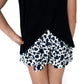 Join the cutest crew on the farm with these bold and playful Moo Crew Shorts! Featuring a trendy black-and-white cow print, these shorts are perfect for your little wild one who's not afraid to stand out from the herd.